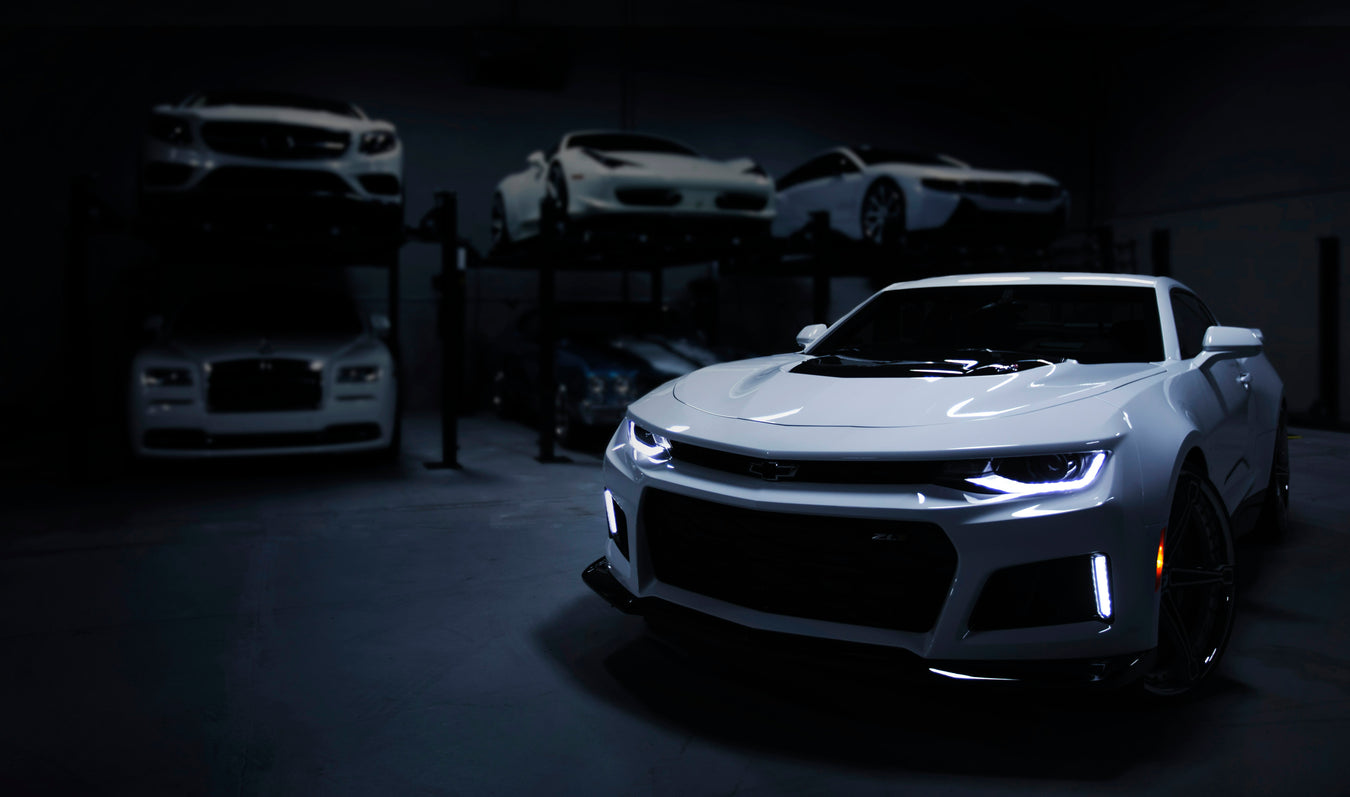 Premium car interior with a modern dashboard, steering wheel, and automotive accessories for enhanced comfort, safety, and driving experience.