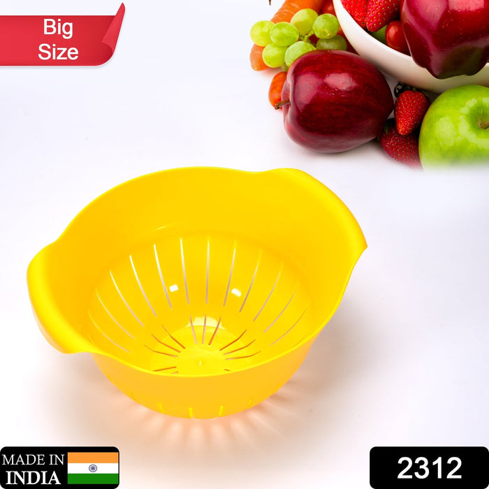 Plastic bowl with built-in strainer for noodles.