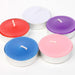 Brightly colored decorative candles in a set