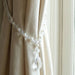 Elegant beaded drapery strap
