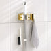 Space saving broom and mop hanger