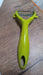 Sturdy stainless steel peeler for peeling fruits and vegetables, ideal for everyday kitchen use.