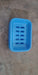 Covered plastic soap holder, helps in maintaining soap longevity.