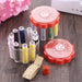 Sewing box with multiple compartments for organizing threads, needles, and sewing supplies.