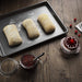 Detailed view of the aluminium baking tray, showcasing its design and durability