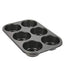 Reliable muffin cup tray with non-stick surface, 6 slots.