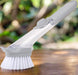 Liquid dispenser dish brush scrubber