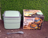 green lunch box with spoon 