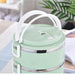 Two layer stainless steel lunch box for keeping food hot.