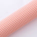 Vibrant acupressure foot massager for relaxation and care.