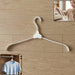 Foldable plastic clothes hanger