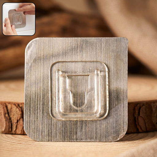 Transparent heavy duty waterproof self-adhesive wall hook on white background