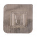 Close-up of sticky transparent wall hook installation