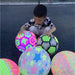 Bouncy LED stress ball for kids, demonstrating its bounce and fun features