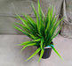 Artificial potted plant with pot, perfect for home decoration.