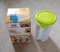 Airtight, transparent storage container with three sections and color box for storage.