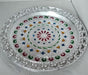 Silver plated pooja thali for religious ceremonies.