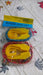 Close-up of strong plastic J shape hooks attached to bungee cord.