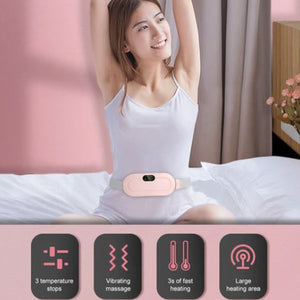 Woman wearing a pink portable massage heating belt around her waist for back pain relief.