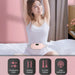 Woman wearing a pink portable massage heating belt around her waist for back pain relief.